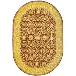 Handmade Majestic Maroon/ Ivory N. Z. Wool Rug (46 X 66 Oval)