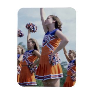 Side profile of cheerleaders with pom poms flexible magnet