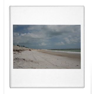 Beach and dune and jetty empty except one vinyl binder