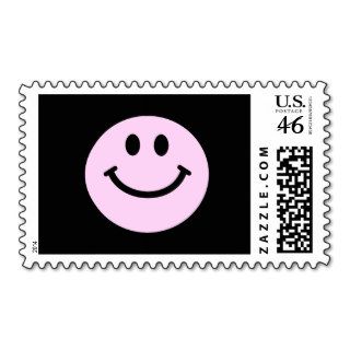 Pink smiley face postage stamp