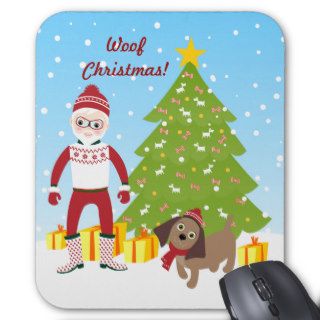 Santa Claus near Christmas tree with puppy Mousepads
