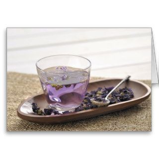 The mallow herb tea which a glass cup contains, greeting card