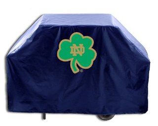 Notre Dame Grill Cover with Shamrock logo on stylish Navy Vinyl by Covers by HBS  Sports Fan Grill Accessories  Sports & Outdoors