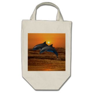 Dolphins at sunset canvas bag