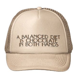 A balanced diet is chocolate in both hands hats