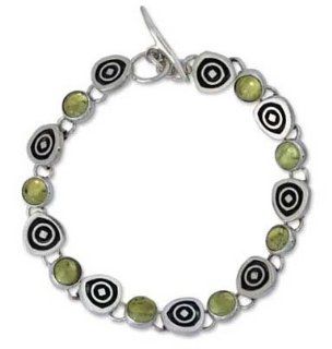 Peridot charm bracelet, 'Hypnotize'   Handmade Taxco Sterling Peridot Bracelet Jewelry