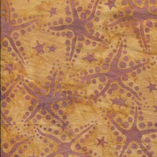 Batik quilt fabric, Starfish, outlined by dots and scattered on sandy brown
