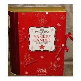 The Twelve Days of A Yankee Candle Christmas ` contains 12 Samplers votive candles 1.75 oz. Book of Candles (Set of 12 Yankee Candle Samplers) Yankee Candle Company Books