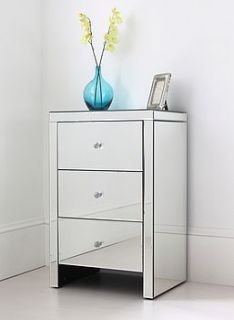 large mirrored bedside table by out there interiors