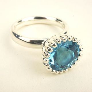 blue topaz and silver cup cake ring by flora bee