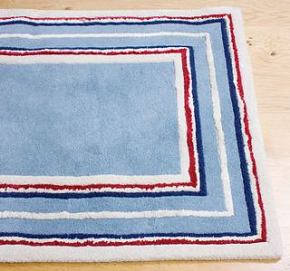 striped border rug by babyface