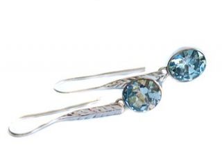 long swiss blue topaz silver earrings by prisha jewels