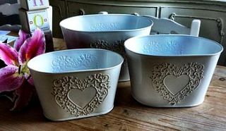 set three white love heart planters by the hiding place