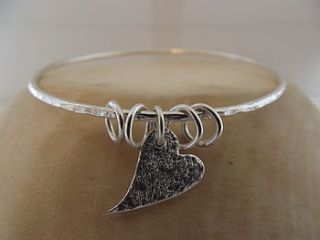 silver tilted heart bangle by lucy kemp jewellery