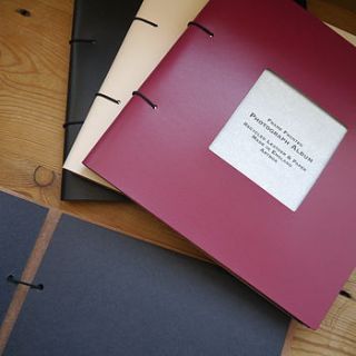 square frame fronted leather photo album by deservedly so