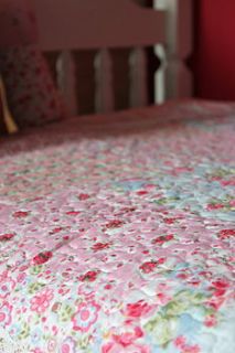 flower print quilted bedspread by the forest & co