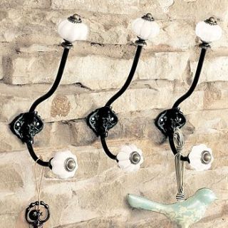 wrought iron and ceramic winter coat hook by dibor