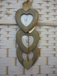 triple hanging heart frame by the dizzy flea