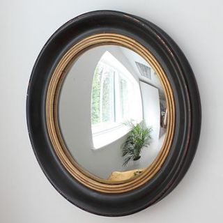 porthole mirror by out there interiors