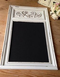 ornate chalkboard by the hiding place