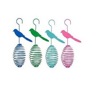 bright coloured spiral bird feeder by the contemporary home