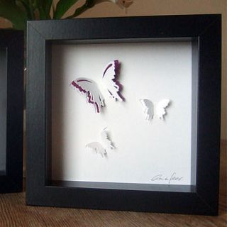 three hand cut paper butterflies by olivia fear designs