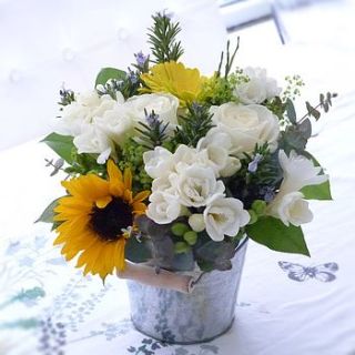 'sunny side up' flower bucket by the flower studio