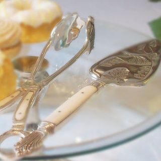 silver & ivory cake server and cake tongs by olivia sticks with layla