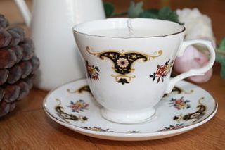 flourish vintage teacup candle by teacup candles