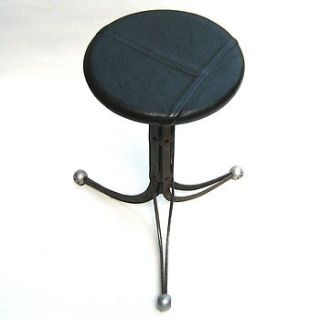 upcycled steel and leather stool by something or other