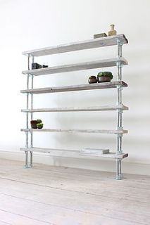 reclaimed wood and steel pipe shelving by inspirit