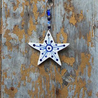 ceramic star shape hanging decoration by roelofs & rubens