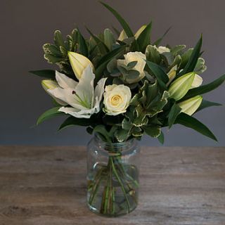 classic white lily and rose flower bouquet by the flower studio