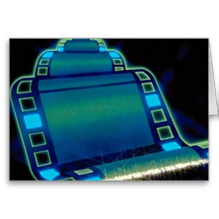 Graphic filmstrip over black background greeting card
