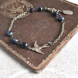 golden bird and blue bracelet by gama