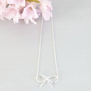 bow charm necklace by lilac coast