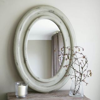 large oval wooden mirror by primrose & plum