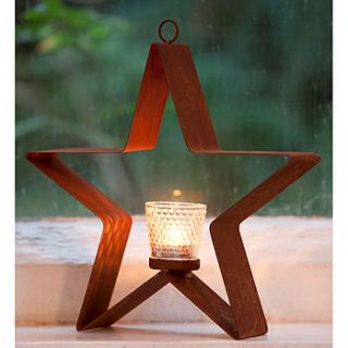 hanging star tea light holder with votive by the orchard