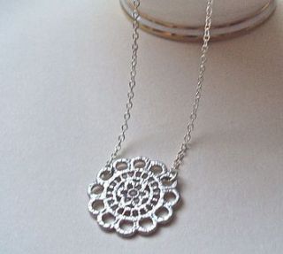 silver daisy necklace by a box for my treasure