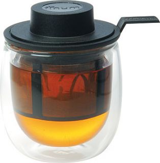 double wall glass tea cup with filter and hat by leaf