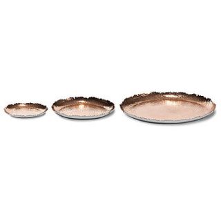 copper hammered dishes by lindsay interiors