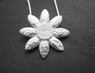 silver daisy pendant by lucy kemp jewellery