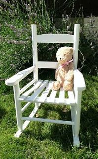 childrens wooden rocking chair by the hiding place