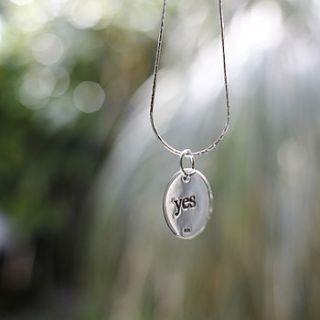 silver yes and no necklace by tales from the earth