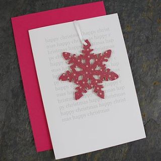 christmas card and snowflake decoration by nest