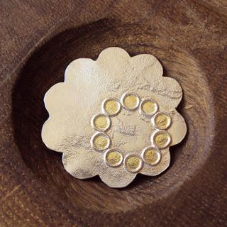silver and gold flower brooch by laura creer
