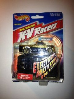 Hot Wheels Mattel Motorized X V Racers Gold Fever Truck. X treme Speed & Stunts. They've Got A Rechargable Motor Inside. Includes XV Racer Power Base Booster Which Charges Racer In Just 10 Seconds. For Use On X V Racer Race Sets Sold Separately. Co
