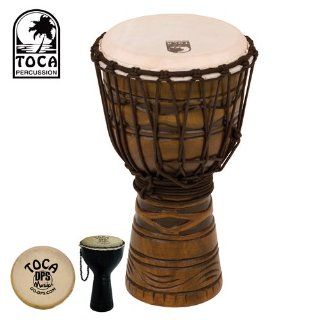 Toca TODJ Origins wood Djembe with 8 inch hand selected goatskin head and African Mask finish. Also includes Toca Shaker (#TDS DPS) " Musical Instruments
