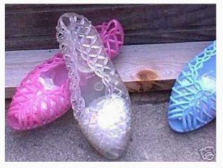Three pair of the Original 80's Jellies, Two Pair Children size 10 and one pair of size 11 to grow on. You will receive an assortment of Ice Clear, Lilac and Blue of the GO EVERYWHERE FUN VINTAGE JELLIE SHOES Toys & Games