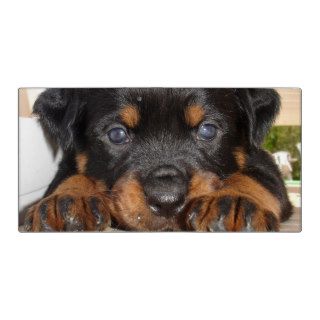 Rottweiler Puppy With Big Paws Lying Down Vinyl Binders